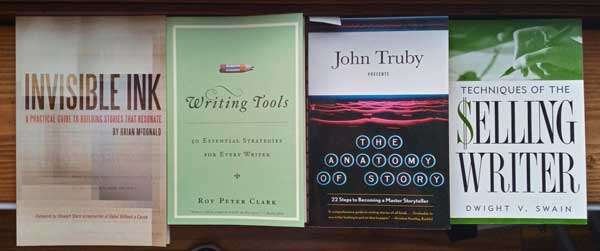 Four paperback books in a row, named in the post text.
